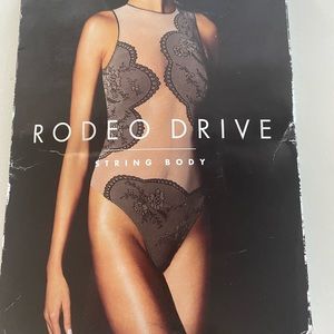 Wolford sheer bodysuit.